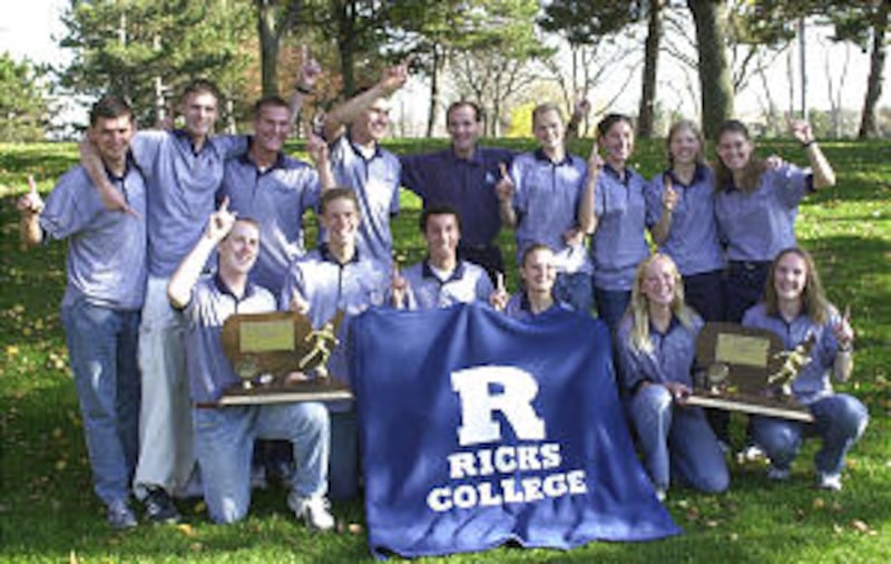 Members of Ricks College men's and women's cross country teams show off their final national champ