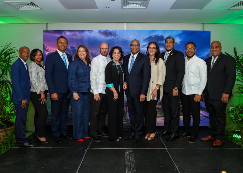 Elder Ahmad S. Corbitt, a General Authority Seventy and member of the Caribbean Area presidency, stands for a photo with government, religious, educational and media leaders at "Dinner for 10" in Santiago de los Caballeros, Dominican Republic, on Sept. 12, 2026.