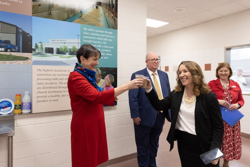 Leaders from Feeding America sample the chocolate milk at Welfare Square during a visit to Salt Lake City, Utah, on Thursday, April 6, 2023.