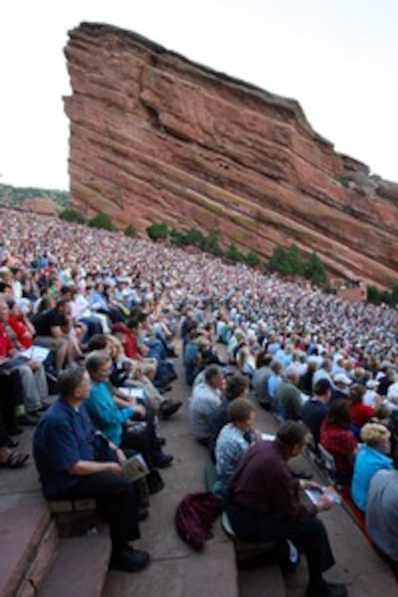 The crowd listens as the Mormon Tabernacle Choir performs at the Red Rocks Amphitheater.