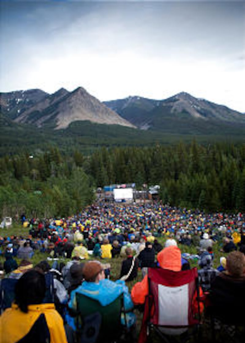 Thousands of LDS Canadian Scouts and their leaders gather at a natural amphitheater to participate i