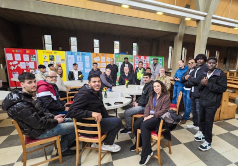 Students and teachers pause for a picture during a weekly EnglishConnect class at the Stevenage Ward building in the St. Albans England Stake in Dorset, England, in early 2026.
