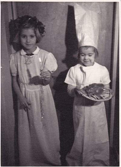 Lisbeth Pettersson, left, dressed up to celebrate the Swedish holiday Saint Lucia on December 13, 1949 with her younger sister Ann-Marie.