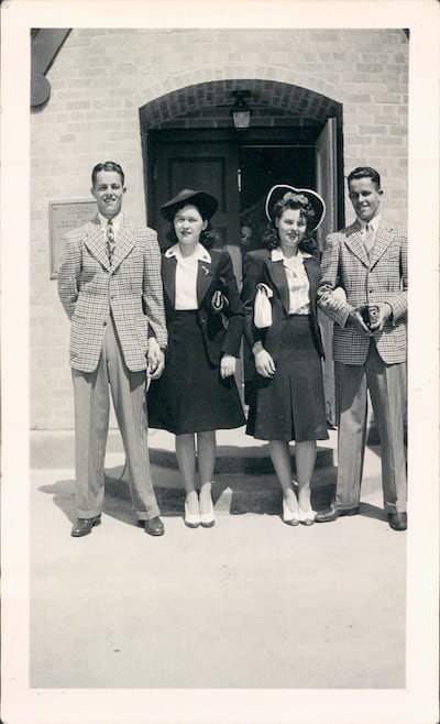 Left, Ralph Henderson and his wife, Lena Henderson. On the right, Boyd Henderson and his wife, Ethel Henderson. The couples are standing in front of a Latter-day Saint chapel in Cheyenne, Wyoming in 1941.