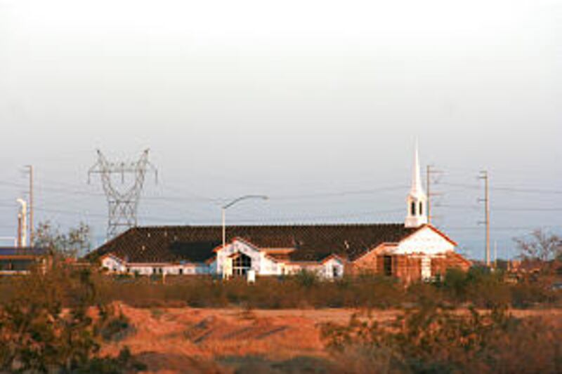 New meetinghouses dot the desert as Church leaders try to keep up with explosive population growth.