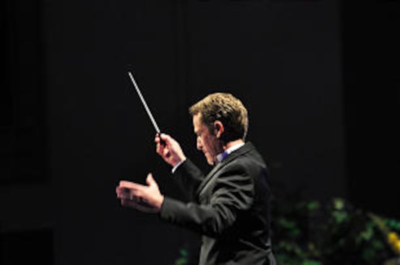 Mack Wilberg, above, and Ryan Murphy, below, conduct the Mormon Tabernacle Choir and Orchestra at Te