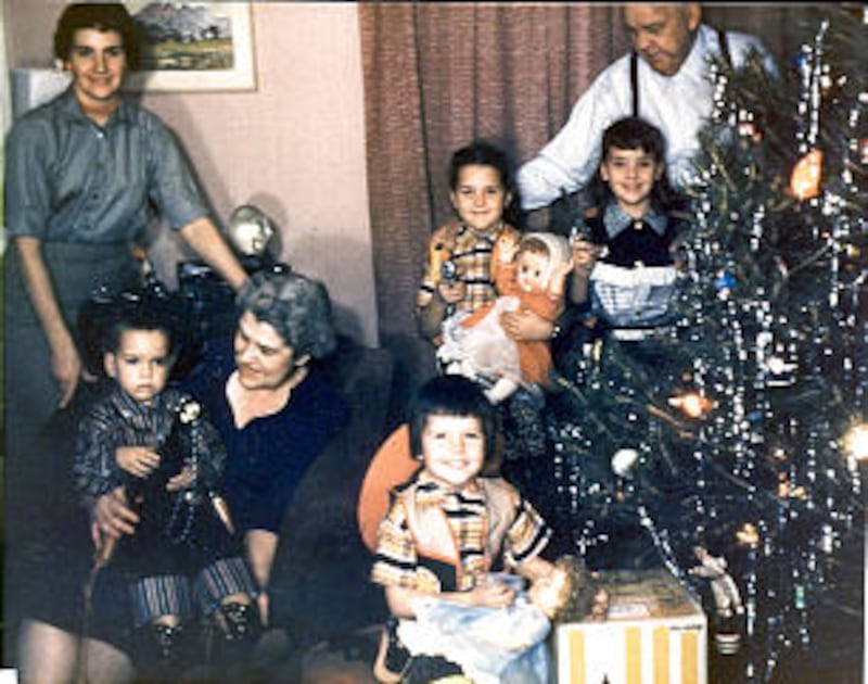 Christmas 1959 at Grandpa Joseph Edward Kjar's home. Grandpa Kjar shown with his arm around 7-year-o
