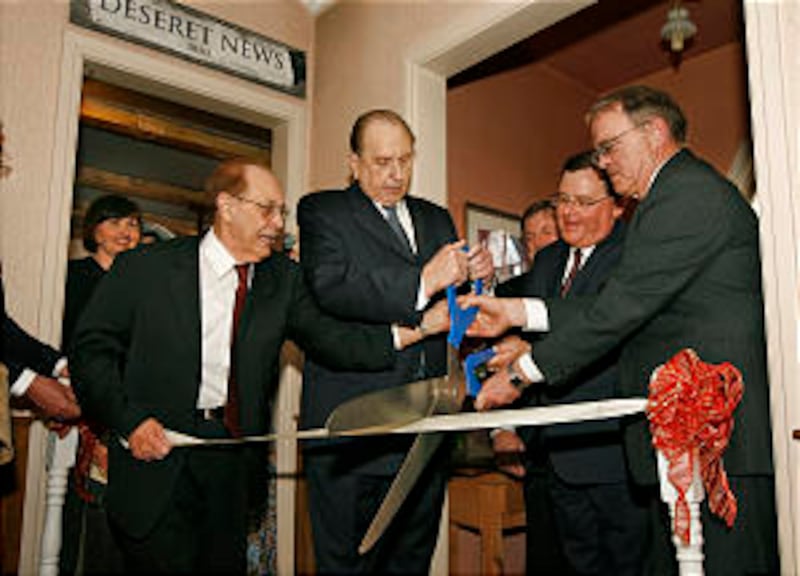President Thomas S. Monson participates in ribbon-cutting ceremony at Crandall Historical Printing M