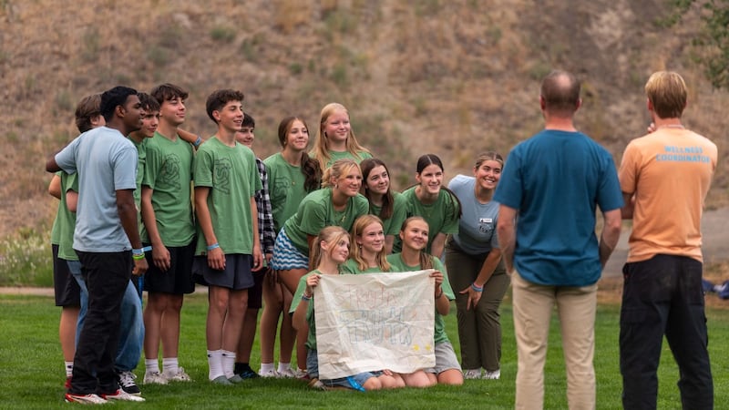 Young adult counselors and their youth group pose for a photo at the For the Strength of Youth conference in Kamloops, British Columbia, in August 2026.