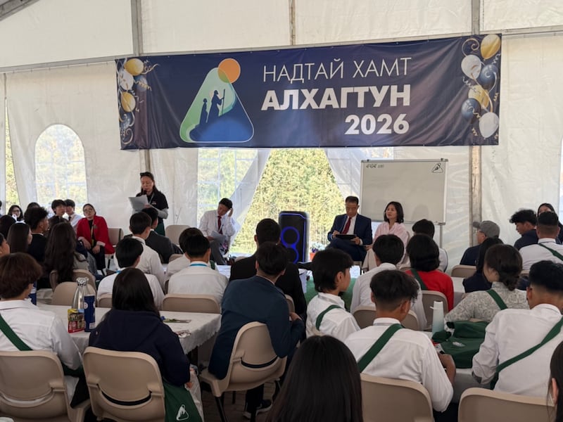 Elder Christopher H. Kim and Sister Seongmi (Sue) Kim prepare to speak at a For the Strength of Youth conference near Ulaantaatar, Mongolia, held June 28- July 3, 2026.
