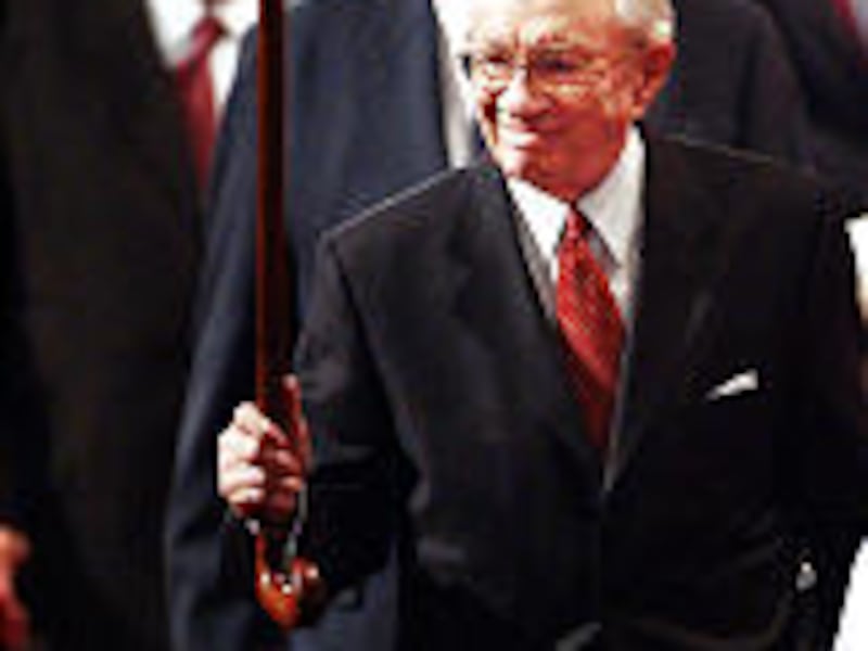 President Hinckley waves to the audience after LDS General Conference Oct 5th, 2002. Allred/photo (