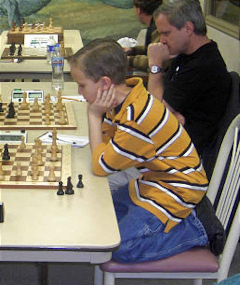 Kayden Troff concentrates during one of his many chess matches.