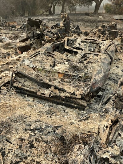 A burned car on the property of Michael Goetz, a Church member who lives in the countryside just north of Vacaville, California. The wildfire came through his property on Aug. 19, 2020, but his home was not destroyed.
