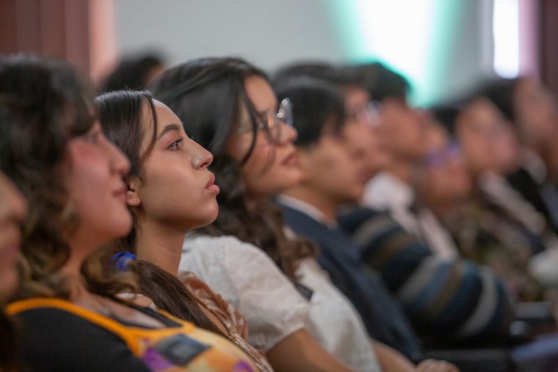 Young women listen to a message from Elder Ulisses Soares of the Quorum of the Twelve Apostles during a devotional in Mexico City, Mexico, on Aug. 28, 2026.