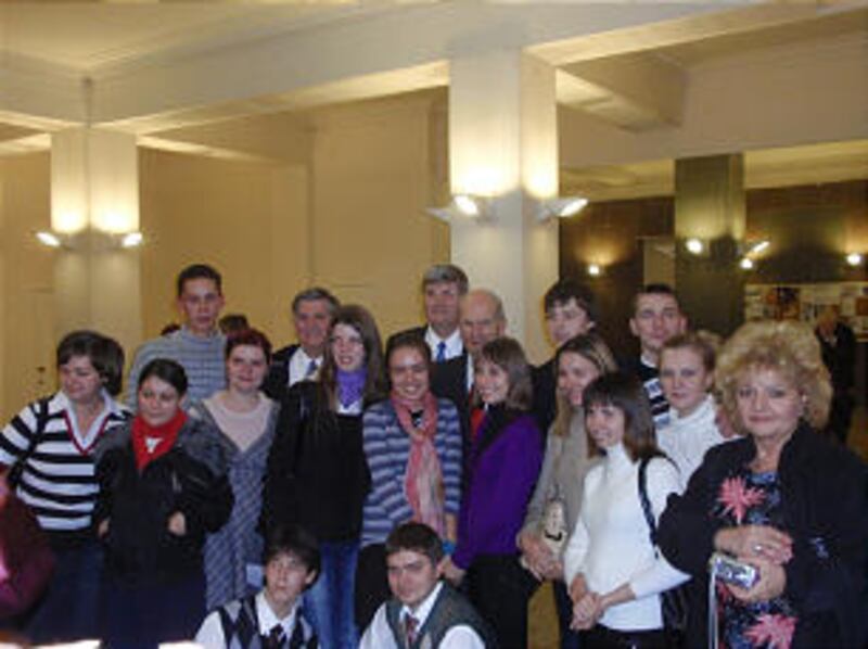 Elder Russell M. Nelson poses with members following the dedication of the Voronezh Branch meetingho