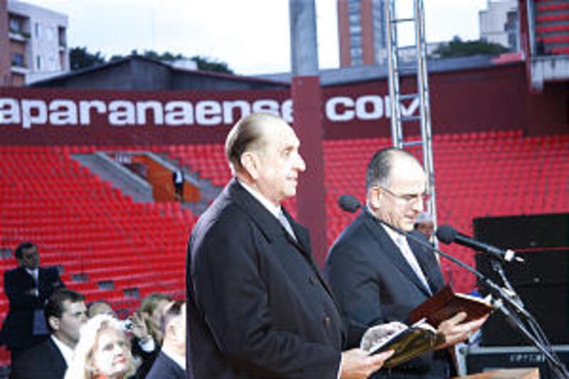 President Thomas S. Monson, left, speaks prior to cultural event as Paulo Grahl translates.
