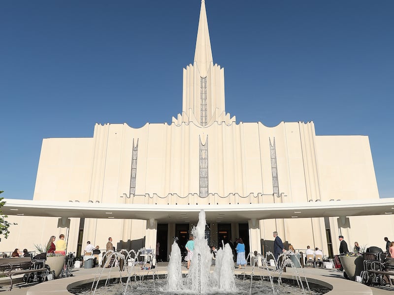 Attendees arrive for the Jordan River Utah Temple rededication in South Jordan on Sunday, May 20, 20