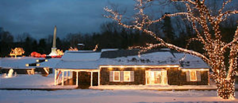 Christmas lights adorn the grounds of the birthplace of Joseph Smith in near Sharon, Vermont Thursda