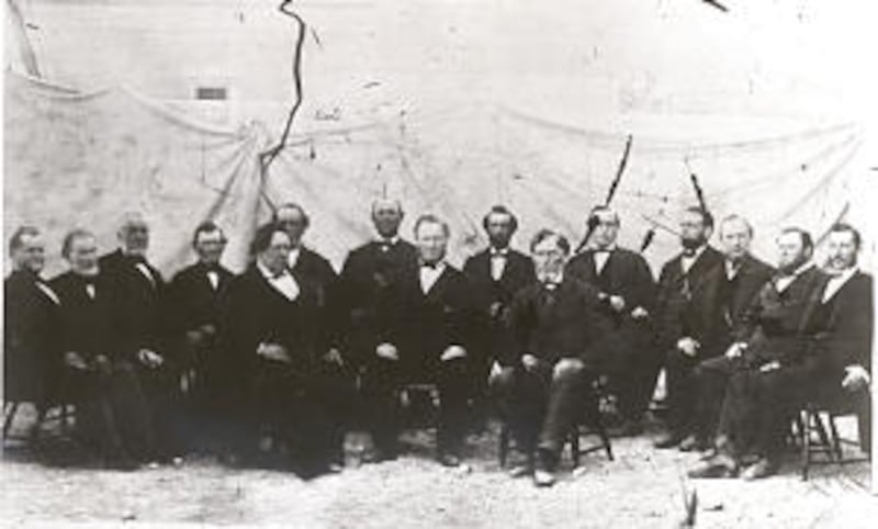 In 1860s photo, President Brigham Young is seated between his counselors, George A. Smith and Daniel