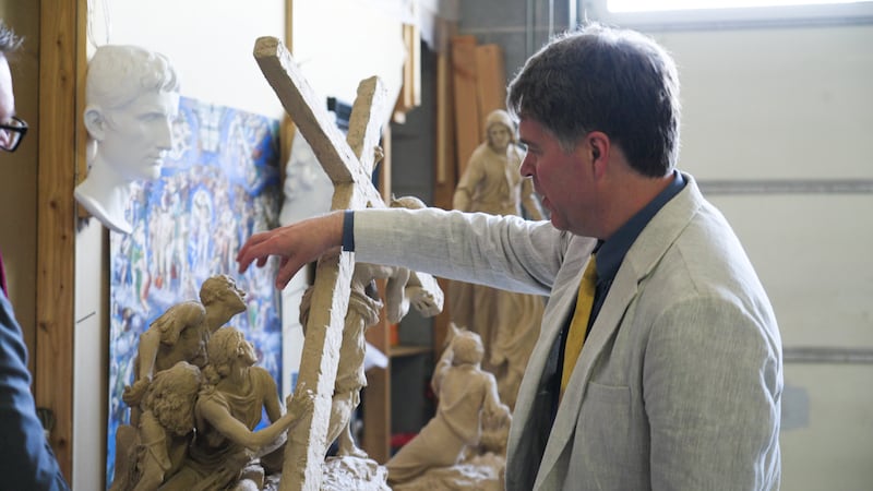Sculptor Michael Hall shows one of his sculptures at his studio in Provo, Utah, on Wednesday, May 20, 2026.