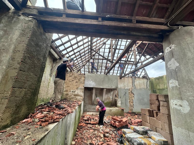 Latter-day Saint volunteers support cleanup efforts in the small village of Chumbaria in Central Portugal after deadly storms hit the country in early February 2026.