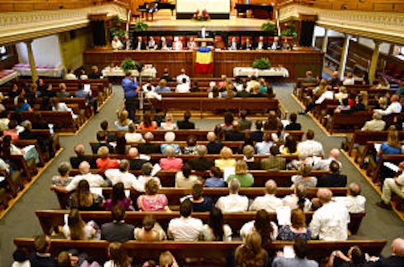 Former missionaries to the Romania Bucharest Mission and members celebrate the 20th anniversary at a