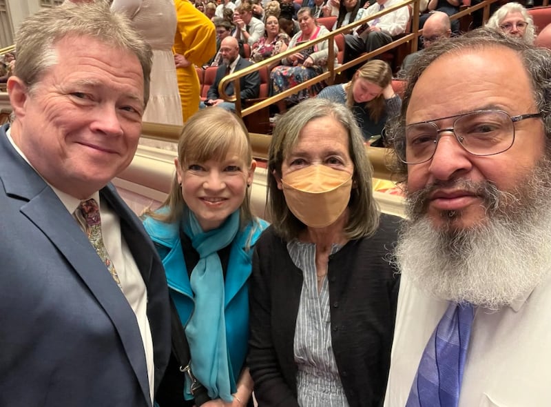 Tom Brett, Andrea Brett, Jan Pinborough and Demetrius O’Neal take a selfie at the Conference Center in Salt Lake City on April 6, 2025.
