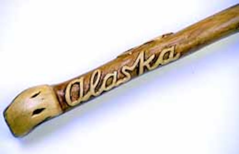Joseph F. Smith's "Alaska" walking stick. The exhibit also includes photos of well-known people of t