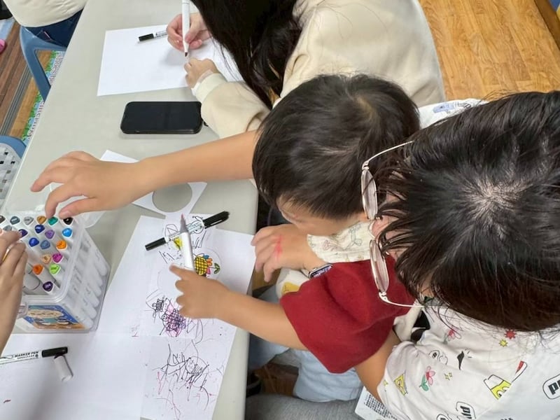 Latter-day Saint young adults serve children at a children’s hospital in Changhua City, Taiwan. The young adults visit the hospital twice a month to share music and art therapy.