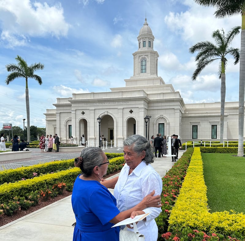 Betty Antonia Castro Torres, right, and María Rodríguez Salinas, left, share a warm embrace outside the Managua Nicaragua Temple following the dedication in Managua, Nicaragua, on Sunday, Oct. 18, 2026.