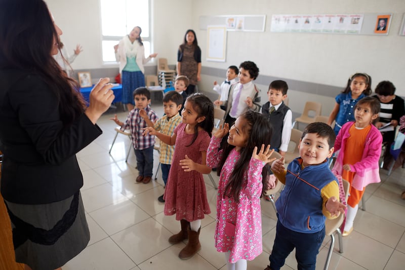 Primary children take part in singing time in Chile.