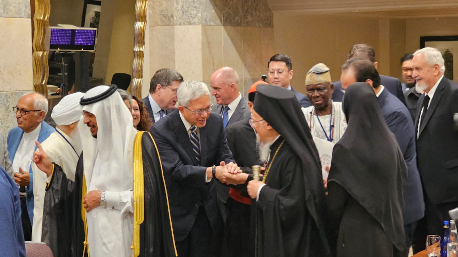 Elder Gerrit W. Gong shakes hands with the Ecumenical Patriarch of Constantinople, after a session of the World Council of Religions for Peace in Istanbul, Turkey, Tuesday, July 29, 2025.