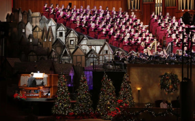 The Mormon Tabernacle Choir sings during the Christmas Devotional in the Conference Center in Salt L