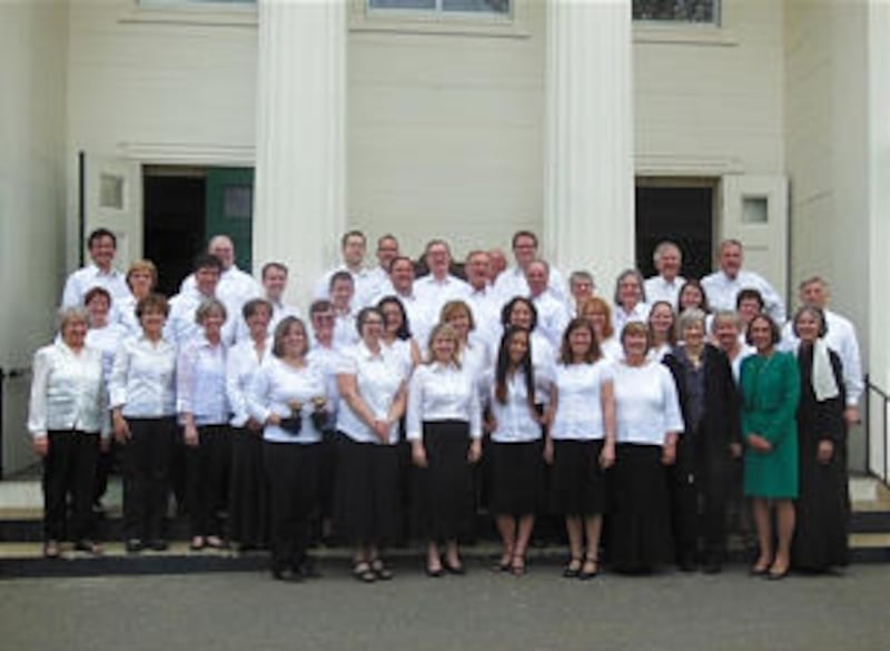 A combined choir composed of members from the Arlington Ward and Topsfield Congregational Church, to
