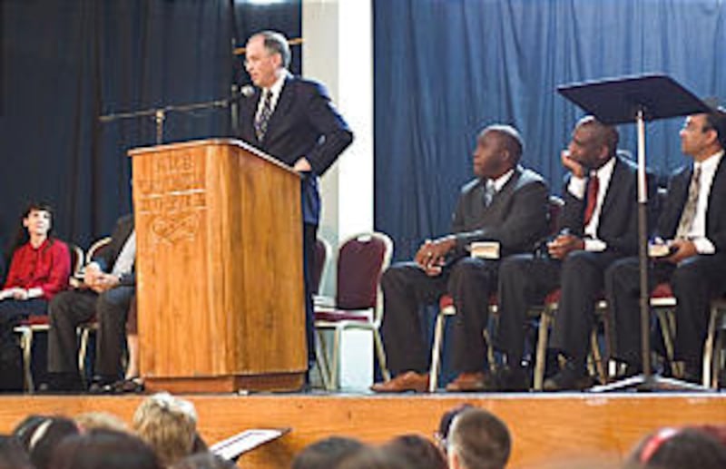 Elder Neil L. Andersen addresses members at the creation of the Port of Spain Trinidad Stake March 1