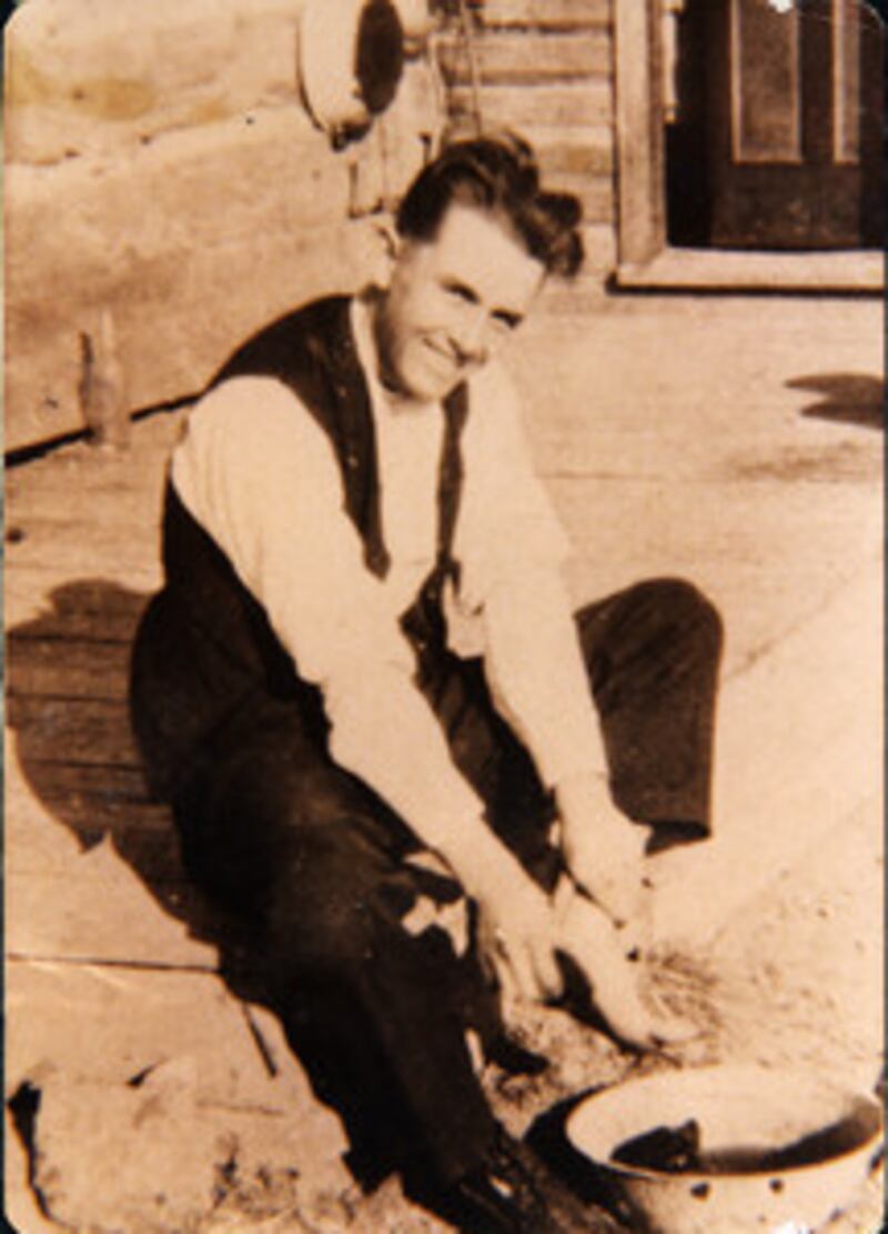 As a young Central States missionary, Spencer W. Kimball washes his feet in Pea Ridge, Mo., about 19