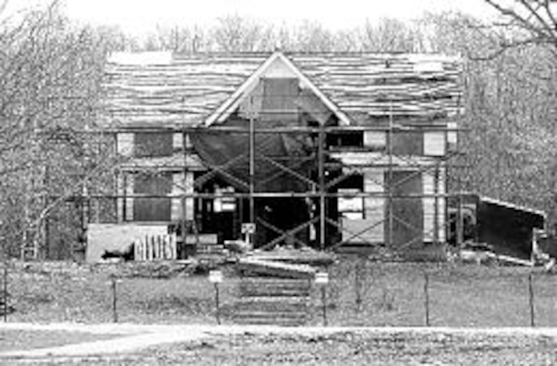 During extensive project, home was stripped to its original state, shown in April 2000 during that p