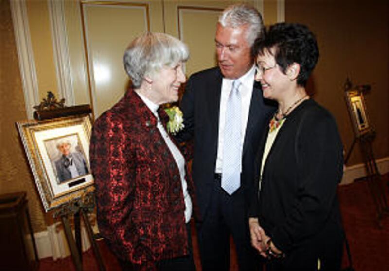 Pamela Atkinson, left, visits with President Dieter F. Uchtdorf, second counselor in the First Presi