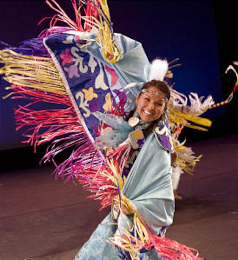 Amy Isaac, member of BYU's Living Legends, performs a Fancy dance of North America. Living Legends i