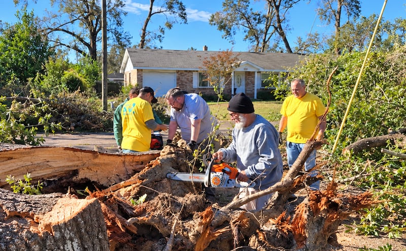 Latter-day Saint volunteers clean up debris following Hurricane Isaias, in Pensacola, Florida, on Saturday, Oct. 17, 2026.