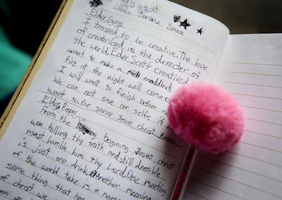Lanaea Clifton, 8, of Gunnison, Colorado, kept notes during the 188th Semiannual General Conference of The Church of Jesus Christ of Latter-day Saints held in the Conference Center in downtown Salt Lake City on Saturday, Oct. 6, 2018.