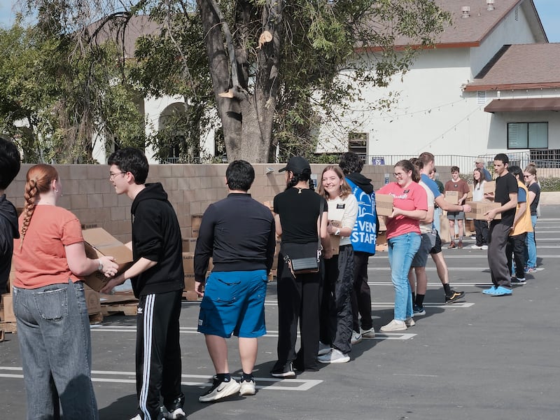 Volunteers unload boxes of food donated by The Church of Jesus Christ of Latter-day Saints in Yorba Linda, California, on Thursday, Feb. 5, 2026. A semitruck full of food was delivered to several food banks as part of a larger donation to 250 food banks across the country in celebration of the 250th anniversary of the United States.