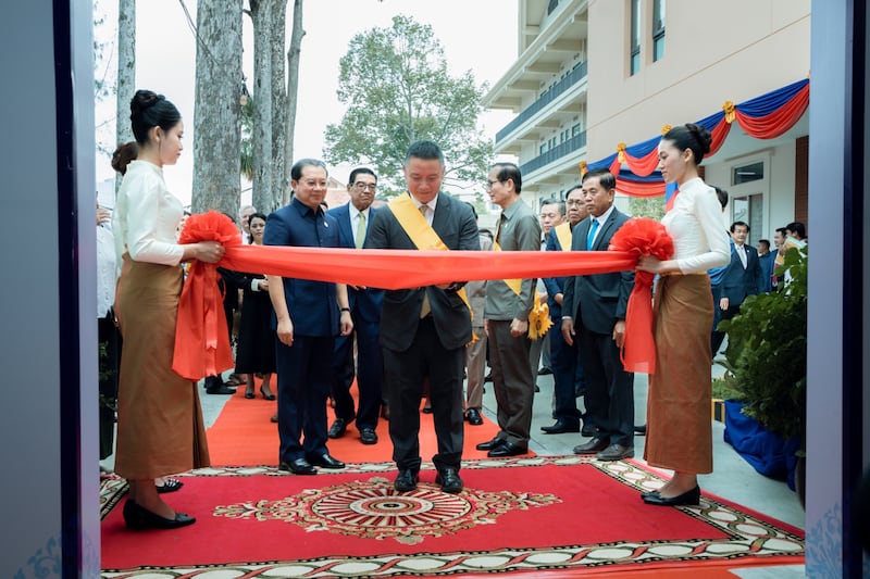 Elder Benjamin M.Z. Tai, General Authority Seventy and the Asia Area president, cuts a ribbon to commemorate the grand opening of at the new heart center at the Siem Reap Provincial Referral Hospital in Siem Reap, Cambodia, on Feb. 26, 2026.