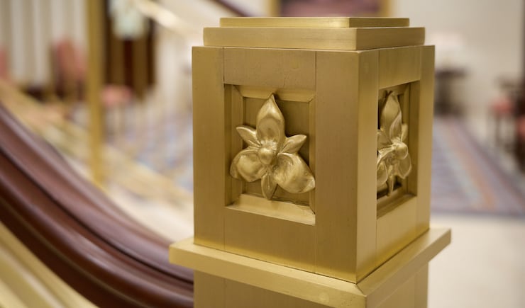 The design of Guatemala's national flower, the monja blanca, is shown on staircase railing inside the Miraflores Guatemala City Guatemala Temple.
