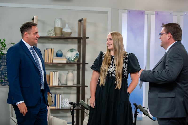 2026 Utah Area YSA Conference co-chairs Zach Sutton, left, and Shelby Hurst, center, talk with Church News editor Jon Ryan Jensen, right, before recording a Church News podcast episode released Tuesday, Aug. 11, 2026.