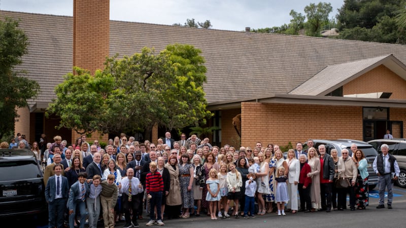 Members of the Pacific Palisades Ward in the Los Angeles California Stake take a group photo outside their rededicated meetinghouse on Sunday, April 12, 2026.