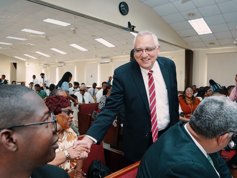 Elder Hugo Montoya, a General Authority Seventy and member of the Caribbean Area presidency, shakes hands with a member at a special conference in Puerto Plata, Dominican Republic, on Sept. 13, 2026.