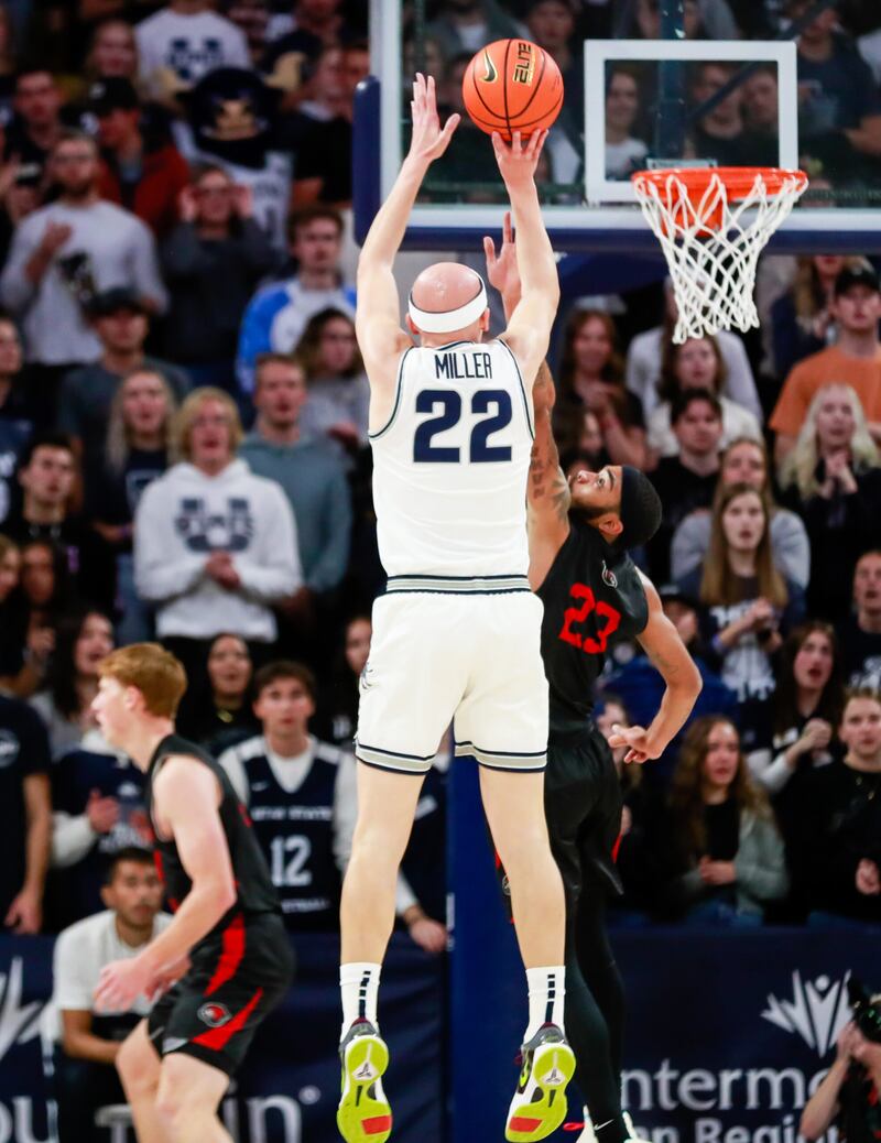 Brock Miller shoots the ball during a USU basketball game