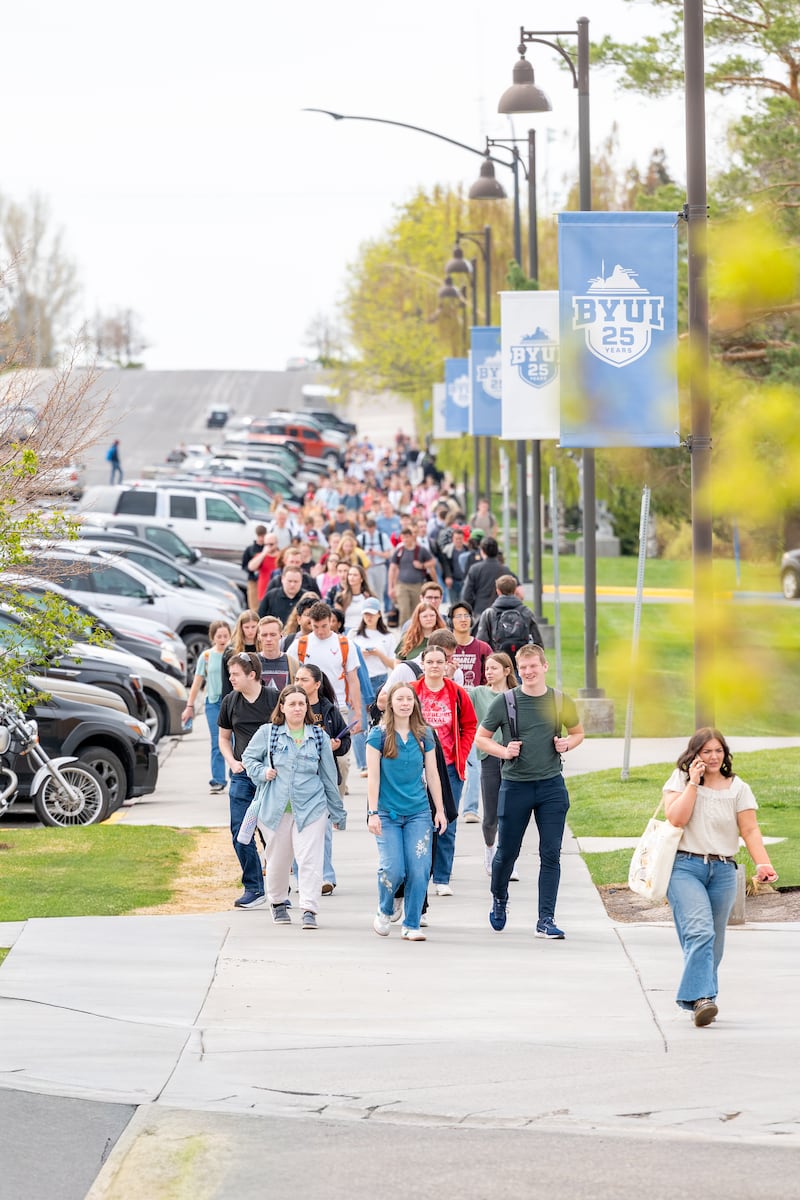 Brigham Young University–Idaho students walk to a campus devotional to hear President Alvin F. Meredith III and his wife, Sister Jennifer Meredith, on Tuesday, April 21, 2026, in Rexburg, Idaho.