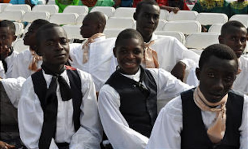 Young men from Accra, Ghana, play the role of the three witnesses to the Book of Mormon during the p